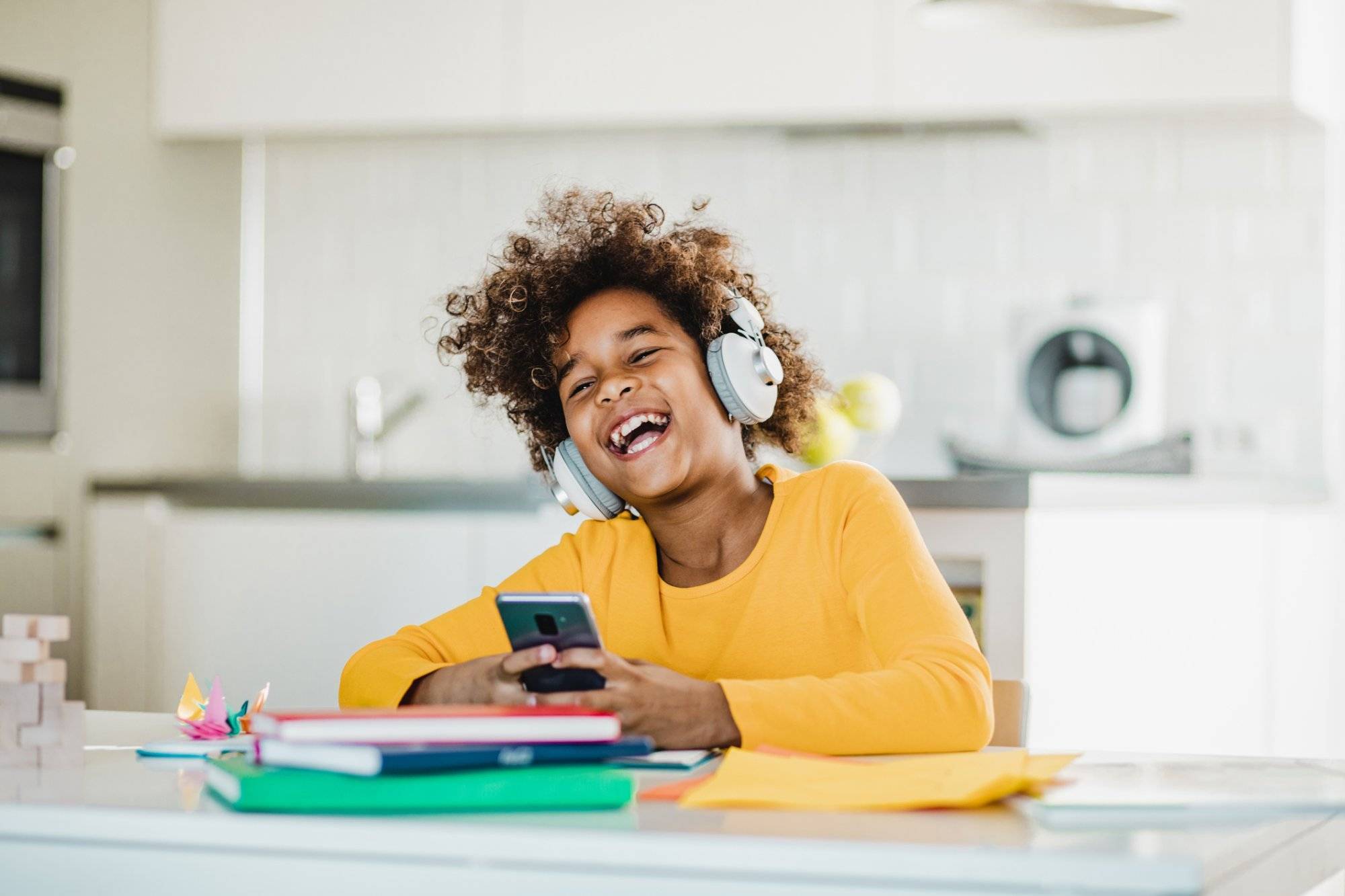 Young girl studying with smart phone